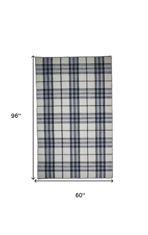 Homeroots 5' X 8' Ivory Blue And Black Abstract Hand Woven Stain Resistant Area Rug Ivory,Blue,Black Other Material 512391