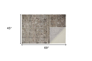 HomeRoots 4' Taupe Ivory and Gray Abstract Distressed Area Rug with Fringed Edges for Modern Home Decor 4' X 6' 512477