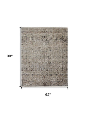 HomeRoots 4' Taupe Ivory and Gray Abstract Distressed Area Rug with Fringed Edges for Modern Home Decor 5' X 8' 512478