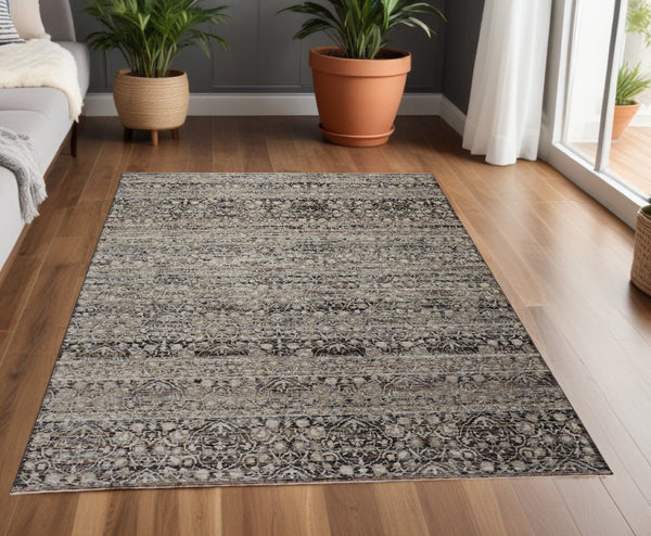 HomeRoots 4' Gray and Ivory Distressed Oriental Area Rug with Fringe – Elegant Comfort for Any Room 4' X 6' 512504