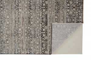 HomeRoots 4' Gray and Ivory Distressed Oriental Area Rug with Fringe – Elegant Comfort for Any Room 4' X 6' 512504