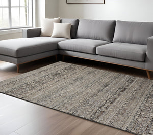 HomeRoots 4' Gray and Ivory Distressed Oriental Area Rug with Fringe – Elegant Comfort for Any Room 7' X 10' 512506