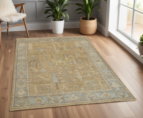 HomeRoots 4' Hand Knotted Wool Area Rug in Blue-Gray and Brown Floral Design with Timeless Fringe Tassels 4' x 6' 512604