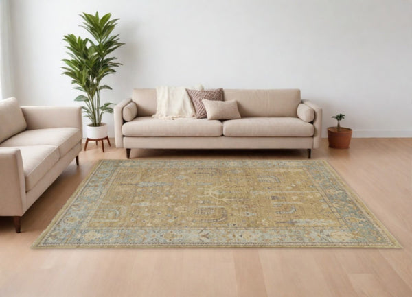 HomeRoots 4' Hand Knotted Wool Area Rug in Blue-Gray and Brown Floral Design with Timeless Fringe Tassels 10' x 13' 512608