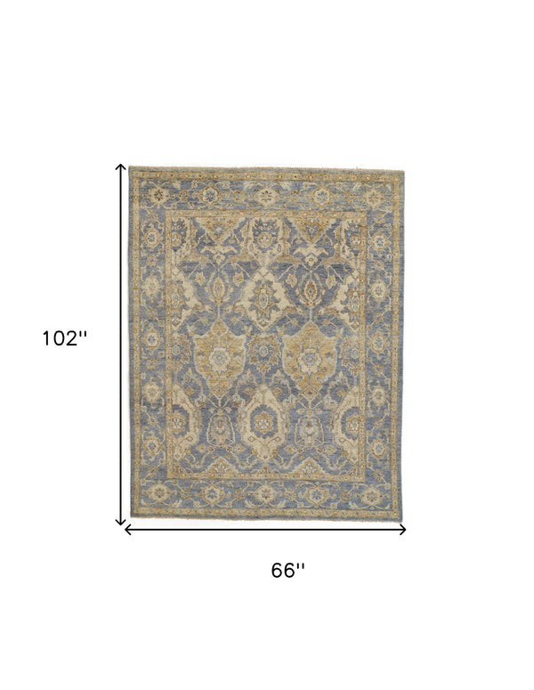 Homeroots 5' X 8' Blue Gold And Tan Wool Floral Hand Knotted Stain Resistant Area Rug With Fringe  Wool 512613