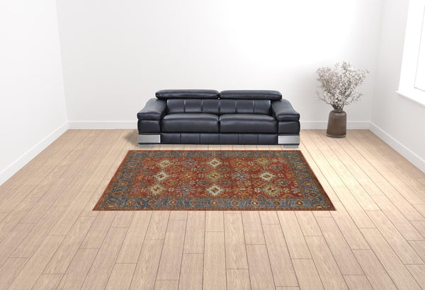 HomeRoots 8' Hand-Knotted Wool Floral Area Rug – Vibrant Red, Blue & Orange Design, Stain-Resistant Elegance 9' X 12' 512631