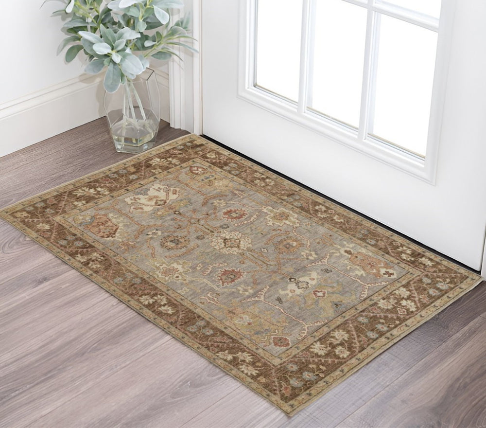 HomeRoots 2' Hand-Knotted Brown and Ivory Floral Wool Area Rug with Fringe for Timeless Home Elegance 2' X 3' 512643