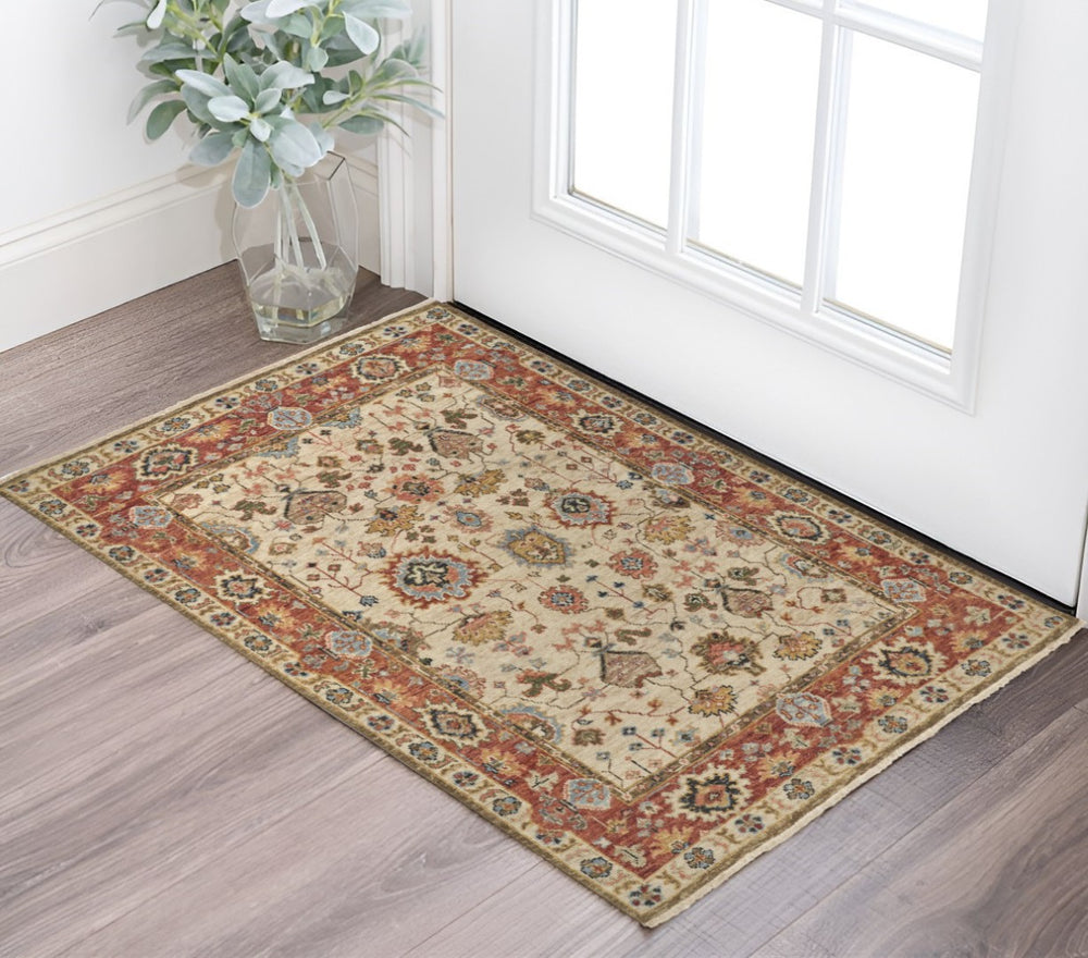 HomeRoots 4' Wool Floral Hand-Knotted Area Rug in Red and Ivory - Timeless Charm for Any Room's Décor 2' X 3' 512659