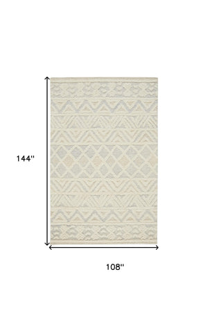 Homeroots 9' X 12' Ivory Blue And Tan Wool Geometric Tufted Handmade Stain Resistant Area Rug  Wool 512770