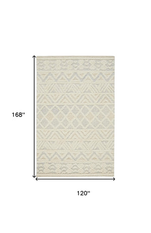 Homeroots 10' X 14' Ivory Blue And Tan Wool Geometric Tufted Handmade Stain Resistant Area Rug  Wool 512771