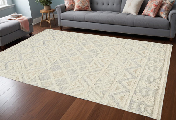 Homeroots 10' X 14' Ivory Blue And Tan Wool Geometric Tufted Handmade Stain Resistant Area Rug  Wool 512771