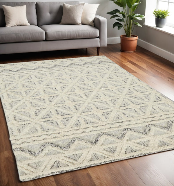 HomeRoots 5' Wool Geometric Tufted Area Rug – Handcrafted Ivory and Black Design, Stain Resistant Texture 5' X 8' 512782