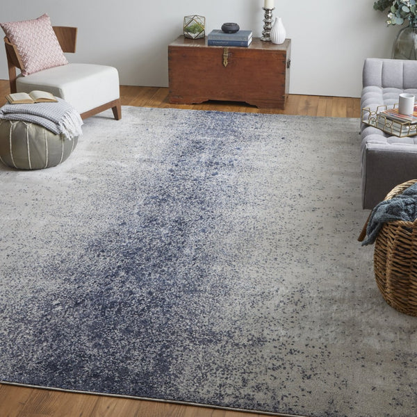 HomeRoots 5' Ivory and Blue Abstract Area Rug - Non-Skid, Power-Loomed Design for Contemporary Interiors 5' X 8' 512817