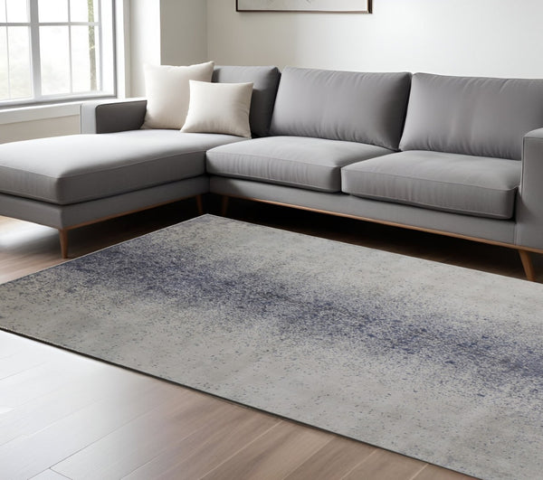 HomeRoots 5' Ivory and Blue Abstract Area Rug - Non-Skid, Power-Loomed Design for Contemporary Interiors 8' X 10' 512818