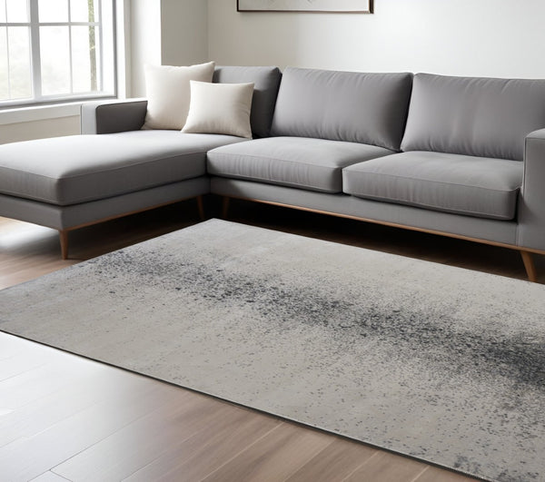 HomeRoots 5' Ivory and Blue Abstract Area Rug - Non-Skid, Power-Loomed Design for Contemporary Interiors 8' X 10' 512827