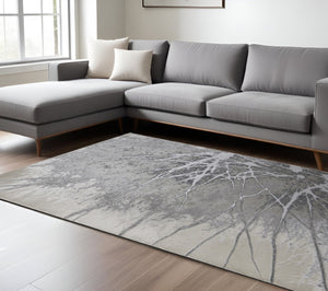 HomeRoots 4' Gray and Ivory Abstract Area Rug - Modern Power Loomed Design with Non-Skid Backing for Safety 8' X 10' 512872