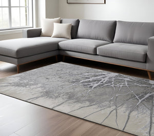 HomeRoots 4' Gray and Ivory Abstract Area Rug - Modern Power Loomed Design with Non-Skid Backing for Safety 7' X 10' 512873