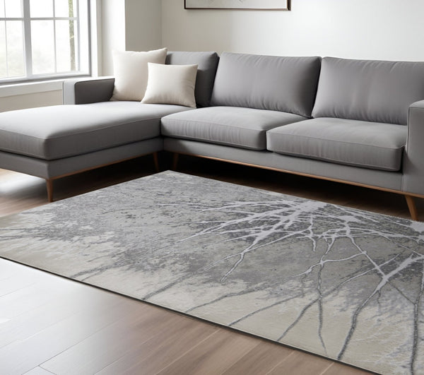 HomeRoots 4' Gray and Ivory Abstract Area Rug - Modern Power Loomed Design with Non-Skid Backing for Safety 7' X 10' 512873