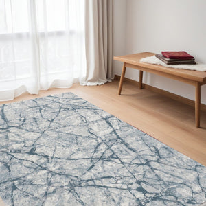 HomeRoots 5' Blue Gray and Ivory Abstract Distressed Area Rug - Stain Resistant, Modern Design for Any Space 5' X 8' 512894