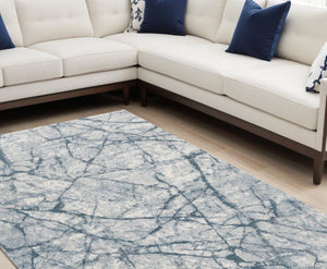 HomeRoots 5' Blue Gray and Ivory Abstract Distressed Area Rug - Stain Resistant, Modern Design for Any Space 8' X 10' 512895