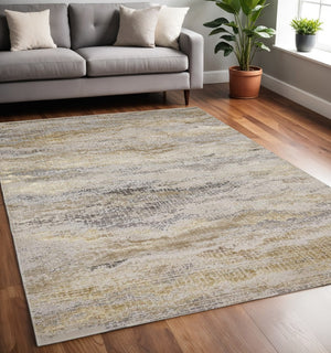 HomeRoots 4' Modern Abstract Area Rug in Gold, Gray & Ivory – Durable, Stylish, Perfect for Any Room 5' X 8' 512946