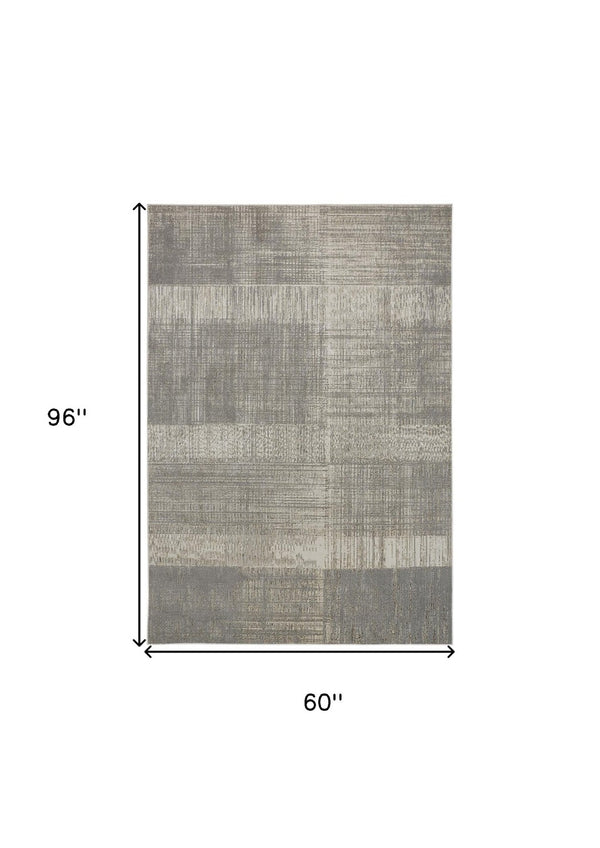HomeRoots 4' Gray and Ivory Abstract Area Rug - Non-Skid Backing for Stability in Modern Living Spaces 5' X 8' 512957