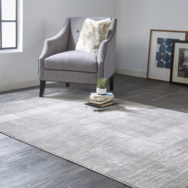 HomeRoots 4' Gray and Ivory Abstract Area Rug - Non-Skid Backing for Stability in Modern Living Spaces 7' X 10' 512959