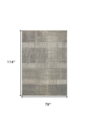HomeRoots 4' Gray and Ivory Abstract Area Rug - Non-Skid Backing for Stability in Modern Living Spaces 7' X 10' 512959