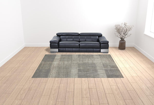 HomeRoots 4' Gray and Ivory Abstract Area Rug - Non-Skid Backing for Stability in Modern Living Spaces 9' X 12' 512960