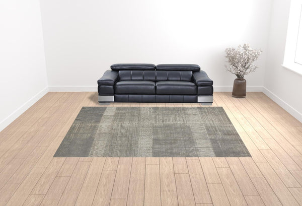 HomeRoots 4' Gray and Ivory Abstract Area Rug - Non-Skid Backing for Stability in Modern Living Spaces 10' X 13' 512962