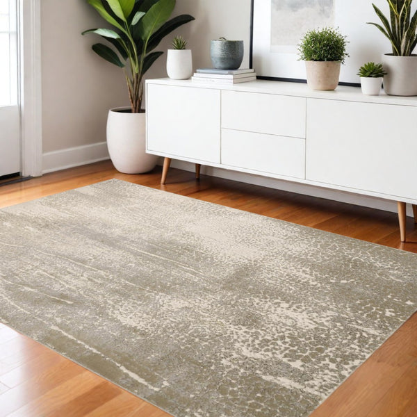 HomeRoots 4' Contemporary Gold Gray Ivory Abstract Area Rug for Modern Living Spaces - Durable & Stylish Design 4' X 6' 512985