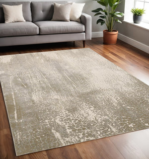 HomeRoots 4' Contemporary Gold Gray Ivory Abstract Area Rug for Modern Living Spaces - Durable & Stylish Design 5' X 8' 512986