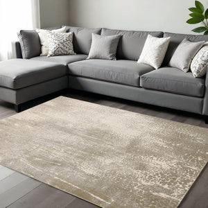 HomeRoots 4' Contemporary Gold Gray Ivory Abstract Area Rug for Modern Living Spaces - Durable & Stylish Design 7' X 10' 512987