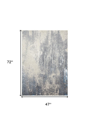 HomeRoots 4' Contemporary Abstract Area Rug in Ivory, Gray, and Blue – Elevate Your Living Space Elegantly 4' X 6' 512995
