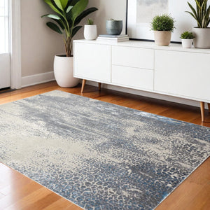 HomeRoots 4' Contemporary Abstract Area Rug in Ivory, Gray, and Blue – Elevate Your Living Space Elegantly 4' X 6' 512995