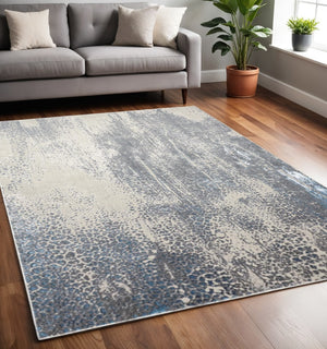 HomeRoots 4' Contemporary Abstract Area Rug in Ivory, Gray, and Blue – Elevate Your Living Space Elegantly 5' X 8' 512996
