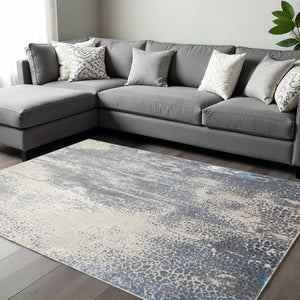 HomeRoots 4' Contemporary Abstract Area Rug in Ivory, Gray, and Blue – Elevate Your Living Space Elegantly 10' X 13' 513000
