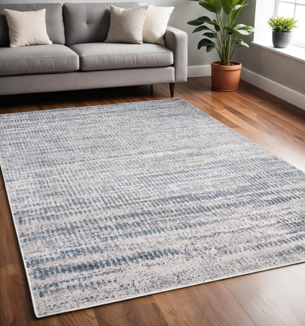 HomeRoots 4' Contemporary Ivory Gray and Blue Abstract Area Rug – Soft, Durable, and Stylish for Any Room 5' X 8' 513006
