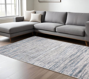 HomeRoots 4' Contemporary Ivory Gray and Blue Abstract Area Rug – Soft, Durable, and Stylish for Any Room 10' X 13' 513010