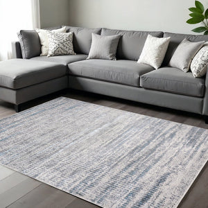 HomeRoots 4' Contemporary Ivory Gray and Blue Abstract Area Rug – Soft, Durable, and Stylish for Any Room 12' X 18' 513013