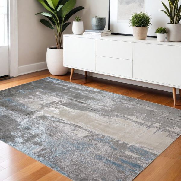 HomeRoots 4' Modern Abstract Area Rug in Gray, Ivory, and Blue - Stylish, Durable Design for Any Room 4' X 6' 513034
