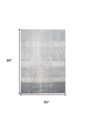 HomeRoots 4' Blue and Gray Abstract Area Rug - Modern Design for Contemporary Spaces, Durable and Stylish Accent 5' X 8' 513046