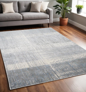 HomeRoots 4' Blue and Gray Abstract Area Rug - Modern Design for Contemporary Spaces, Durable and Stylish Accent 5' X 8' 513046