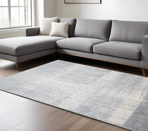 HomeRoots 4' Blue and Gray Abstract Area Rug - Modern Design for Contemporary Spaces, Durable and Stylish Accent 7' X 10' 513048