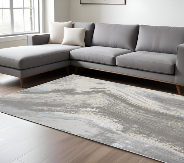 HomeRoots 4' Contemporary Gray Ivory and Blue Abstract Area Rug - Stylish, Cozy Addition for Any Space 8' X 10' 513055