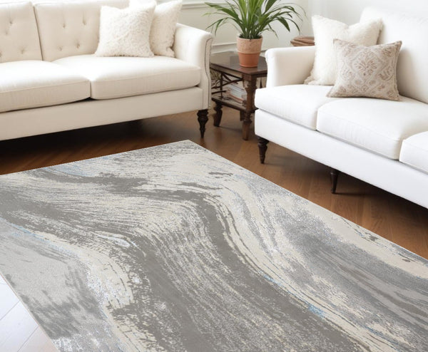HomeRoots 4' Contemporary Gray Ivory and Blue Abstract Area Rug - Stylish, Cozy Addition for Any Space 7' X 10' 513056