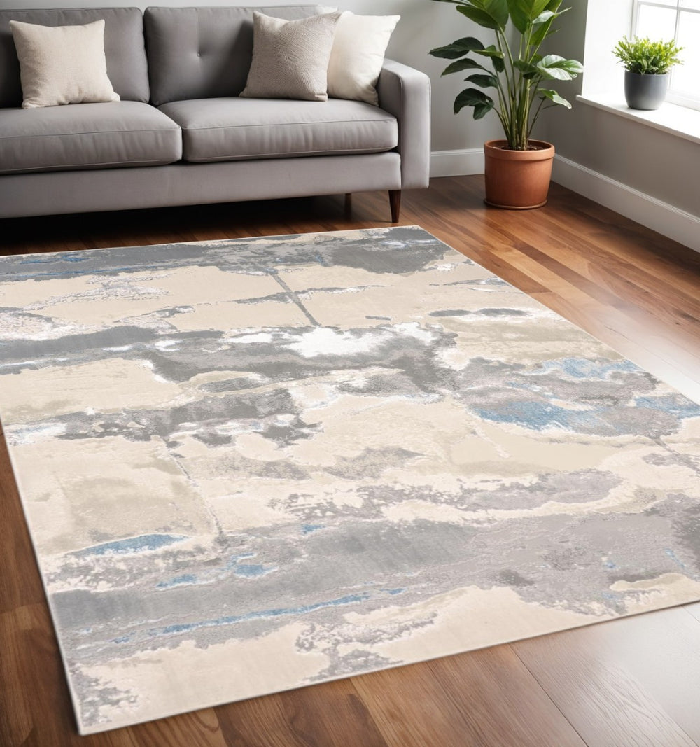 HomeRoots 4' Modern Abstract Area Rug in Soft Gray, Ivory, and Blue for a Cozy Contemporary Home Decor 5' X 8' 513065