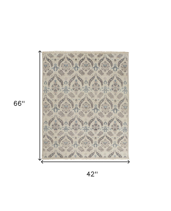 Homeroots 4' X 6' Gray And Ivory Wool Floral Hand Knotted Area Rug  Wool 513094