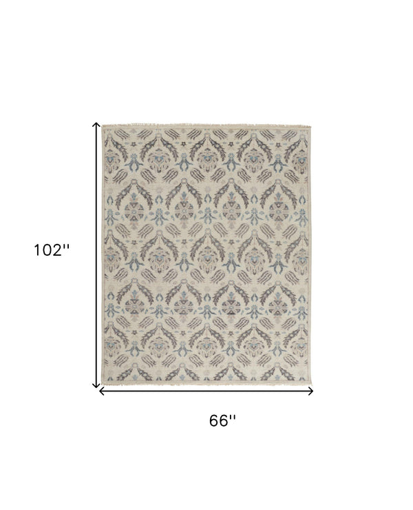 Homeroots 5' X 8' Gray And Ivory Wool Floral Hand Knotted Area Rug  Wool 513095