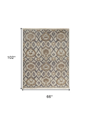 Homeroots 5' X 8' Ivory Gray And Taupe Wool Floral Hand Knotted Stain Resistant Area Rug Ivory,Gray,Taupe Wool 513103